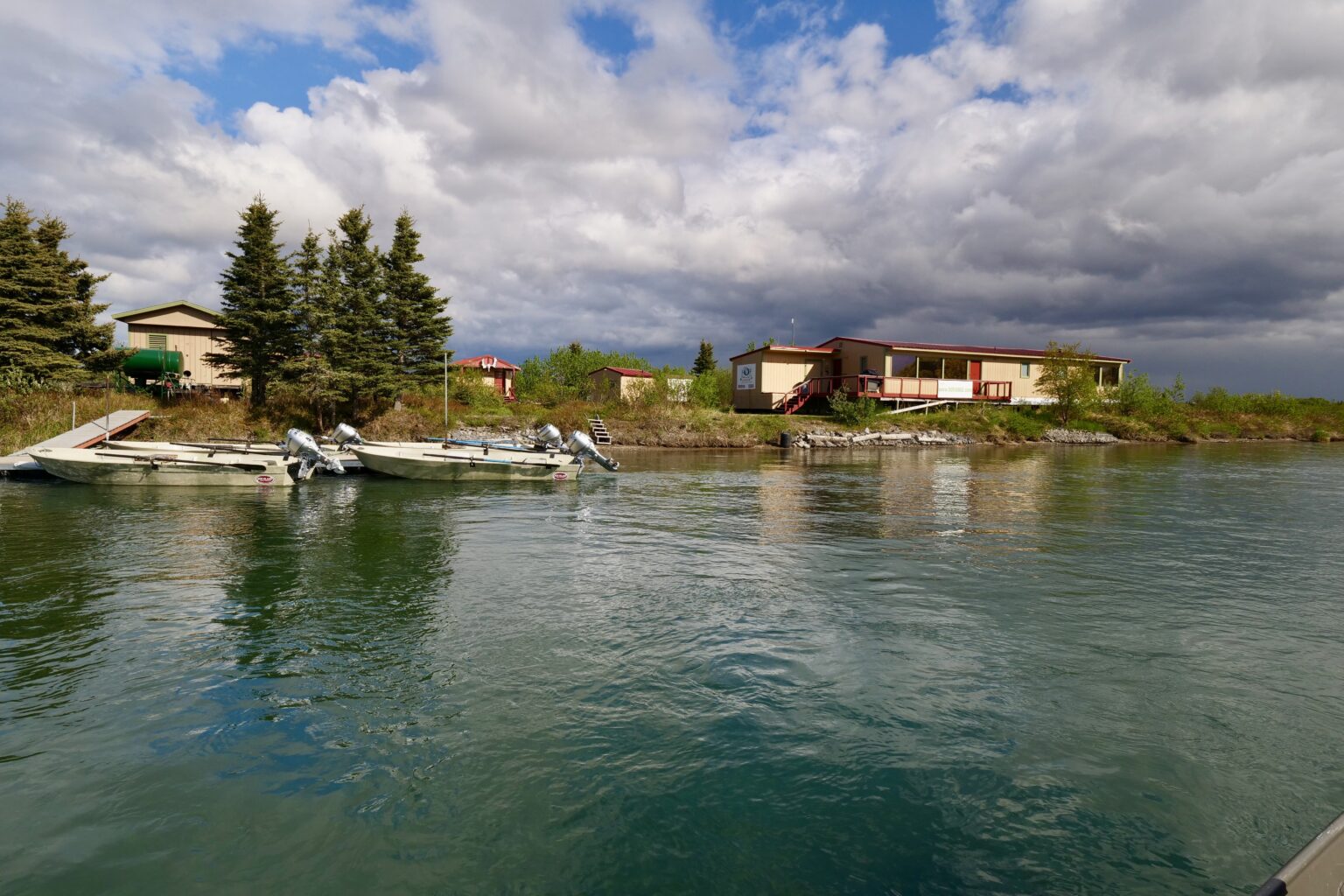 Seasons On The Fly Lodge exterior from the water.